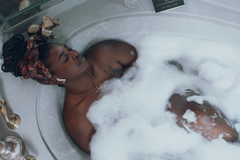 Mother with postpartum depression taking a bath for self care